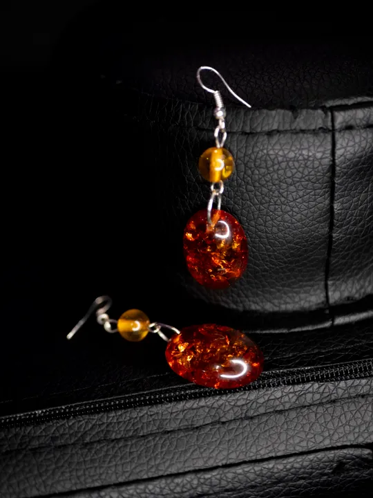 Сережки з ювелірного сплаву з лінд. бурштином Ціна