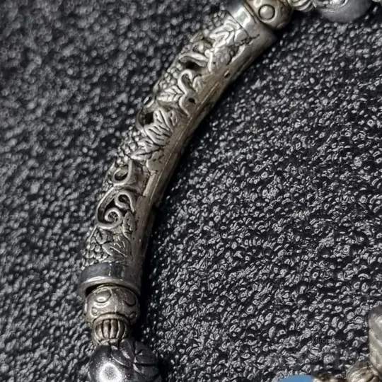 Браслет з блакитним камінням З аукціону