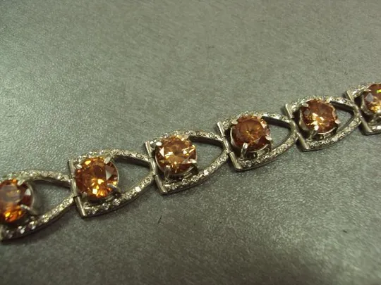 Женский браслет с оранжевыми желтыми и белыми вставками серебро 925 проба украина вес 34,34 г 18 см Характеристики