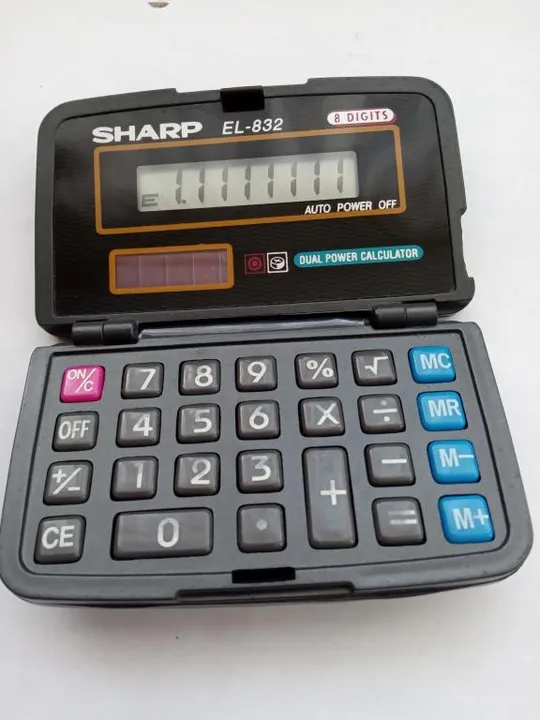Калькулятор Sharp. Made in Japan Продаж