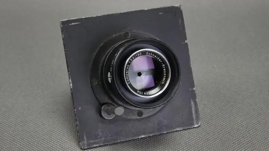 Schneider-Kreuznach Comparon 150mm/5,6 установленный на доску для карданных камер Вживане З аукціону