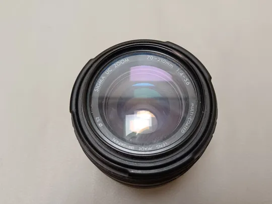 Купити 0565 об&#039;єктив  Sigma UC Zoom 70-210mm 1:4-5.6.  НІМЕЧЧИНА