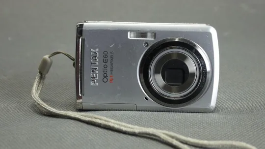 Цифровой фотоаппарат 10.0Mpix Pentax Optio E60 + x3.0 Pentax lens Вживане Ціна