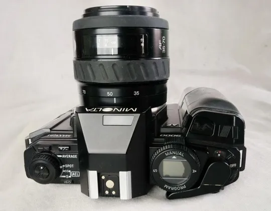 Minolta Maxxum AF 9000 + Minolta AF 35-70/3.5-4.5 Ф49mm + блок AW90 + вспышка Minolta 280PX З аукціону