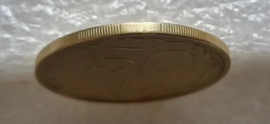 (6478) 50 копійок 1994 1.2АЕм різновид викрошок на вінку між 7 та 8 гронами(50 копеек 1994 1.2АЕм брак) Недорого