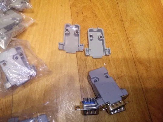 Купити Корпус роз&#039;єму H 9 (для 9 PIN) D-SUB сірий