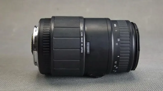Об'єктив Canon EF телеобъектив Sigma 70-300mm 1:4-5.6 DL Macro MC Ф58mm Japan Вживане Продаж
