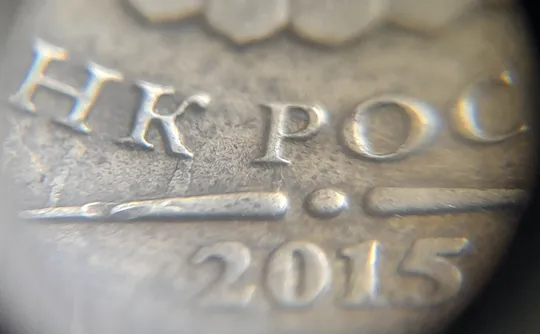 (7796) 10 рублей 2015 РФ, ММД потьоки металу на аверсі та реверсі З аукціону
