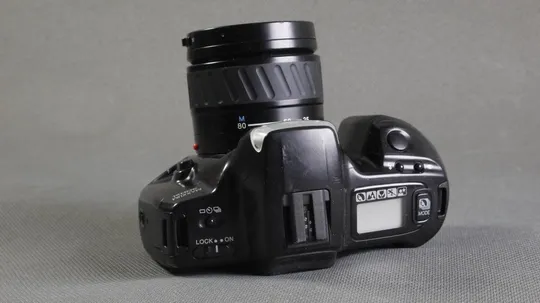 пленочный фотоаппарат Minolta Maxxum 300si + зум объектив Minolta Maxxum AF 35-80/3.5-4.5 Ф46mm З аукціону