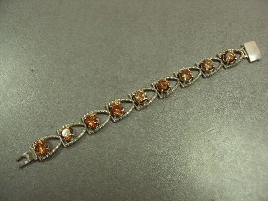 Женский браслет с оранжевыми желтыми и белыми вставками серебро 925 проба украина вес 34,34 г 18 см Ціна