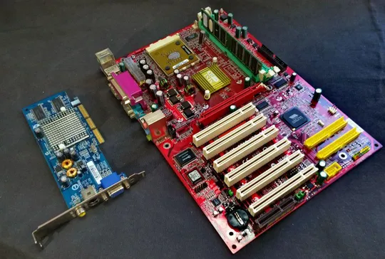 комплект плата MSI KT4AV ATX s462 + AMD Athlon 2600 + память 256Mb + AGP 8x видеокарта Ціна