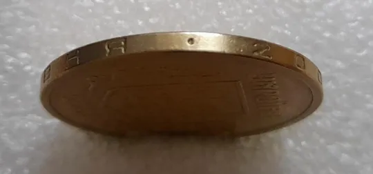 (3909) 1 гривня 2001 1АД1 брак "око змії" на гурті, викрошка (1 гривна 2001) Ціна