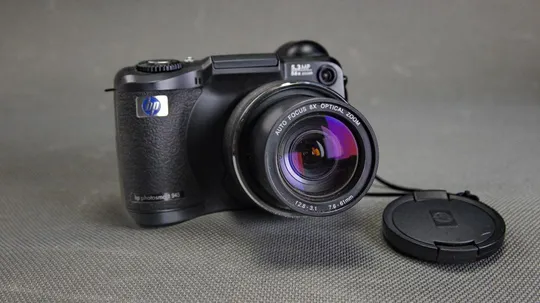 Цифровой фотоаппарат 5.3Mpix HP Photosmart 945 + x8.0 7.6-61mm EQ 36mm Optical Aspheric lens Вживане Ціна