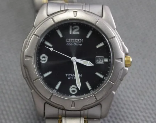 CITIZEN Eco-Drive TITANIUM 100м. дата черный циферблат model: E110-H24610 TA Ціна