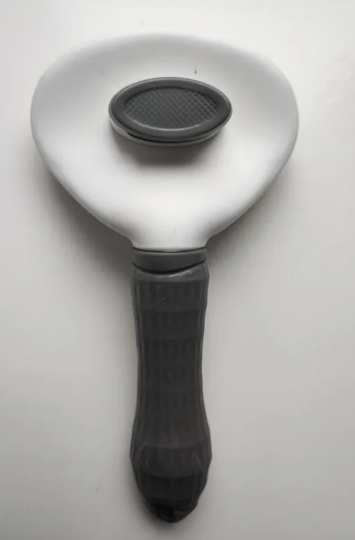 Щітка самоочисна для розчісування шерсті тваринам З аукціону