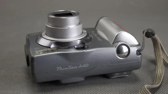 Цифровий фотоаппарат 2.0Mpix Canon Power Shot A40 + x3.0 5.4-16.2mm Canon Aspheric lens Вживане Інтернет-аукціон