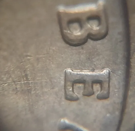 (748) 1 гривня 2006 зминання (здвоєння) "..ИМИ...ВЕ" на реверсі (1 гривна 2006 брак) в Україні