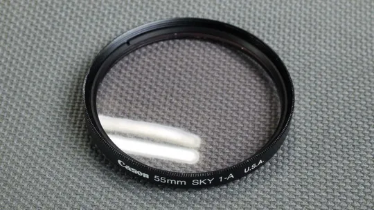 Купити Canon Skylite 1A 55мм. защитный ультрафиолетовый светофильтр 100% оригинал Japan