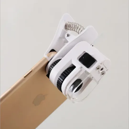 Купити Міні лупа-мікроскоп з прищіпкою,з підсвічуванням для телефона  (TB10-60X)