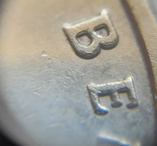 (5073) 1 гривня 2006 двійний удар на реверсі + викрошки вверху цифри "2" слова "2006" та у букві "Н" слова "ОДНА" на гурті (1 гривна 2006 брак) Недорого