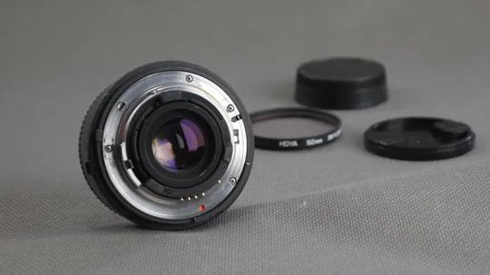 Купити Об'єктив Nikon AF объектив FX Quantaray Tech-10 NF 24mm/2.8 Multi-coated MC Ф52mm Вживане