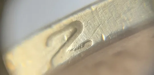 (5129) 1 гривня 2006 гарна викрошка внизу цифри "2" слова "2006" на гурті (1 гривна 2006 брак) Де купити