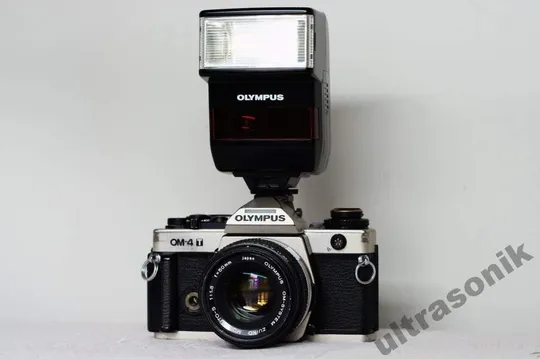 пленочный фотоаппарат Olympus OM-4T + Zuiko 50mm/1.8 MC + вспышка T280 З аукціону