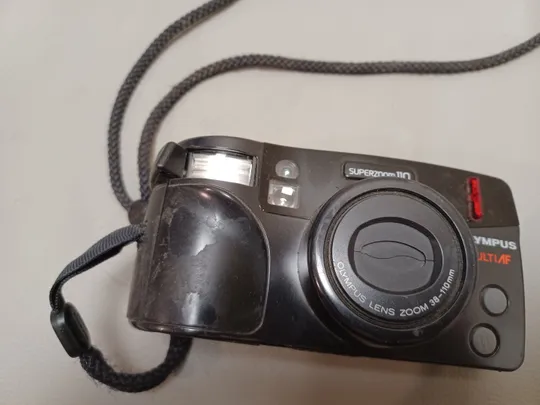 0568  плівкова камера Olympus Superzoom 110  НІМЕЧЧИНА З аукціону