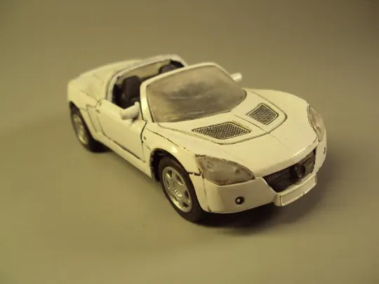 машинка белая опель спидстер 2001 Opel Speedster 1:38 Китай длина 11,5 см №9494 З аукціону