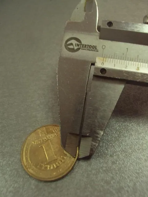 монета украина 1 гривна 2014 брак смещение штемпеля №15126 Де купити