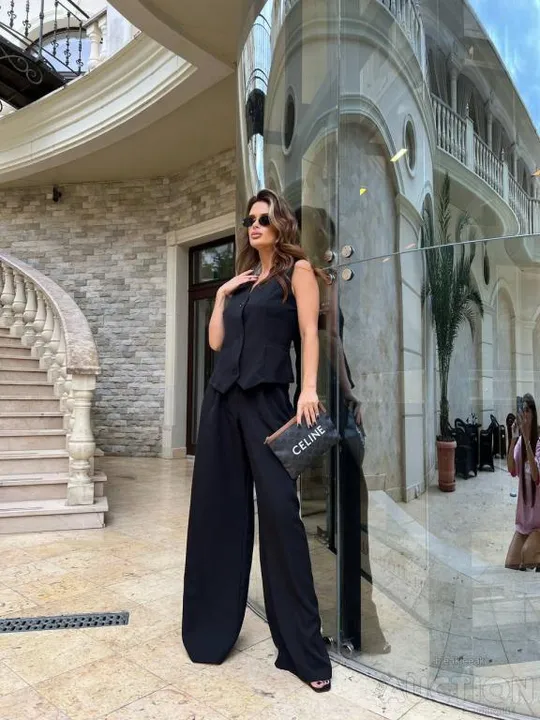 Жіночий костюм жилетка і палаццо колір чорний Де купити