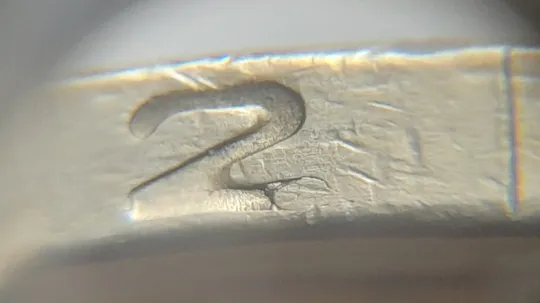 (4823) 1 гривня 2006 різновид викрошки у "2" слова "2006" на гурті + "крокодил" на аверсі (1 гривна 2006 брак) Ціна