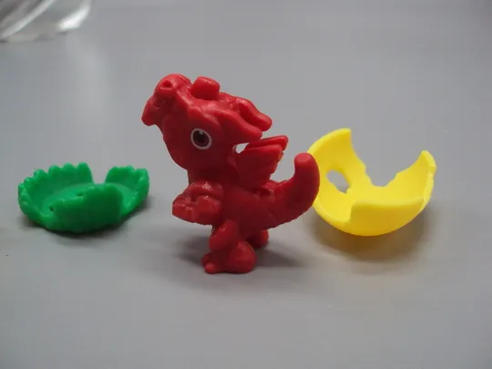 Фигурка киндер сюрприз VQ088 Ferrero дракон в яйце дракончик яйцо №18614л в Україні