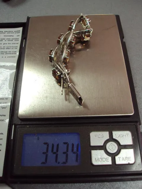 Женский браслет с оранжевыми желтыми и белыми вставками серебро 925 проба украина вес 34,34 г 18 см Де купити