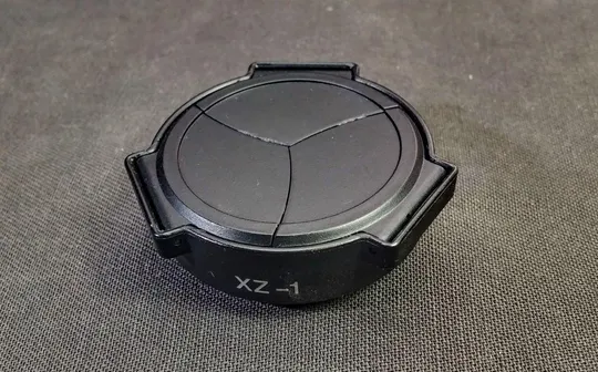 Автоматическая крышка Auto Self-Retaining Open Close Lens Cap for Olympus XZ-1 XZ-2 З аукціону
