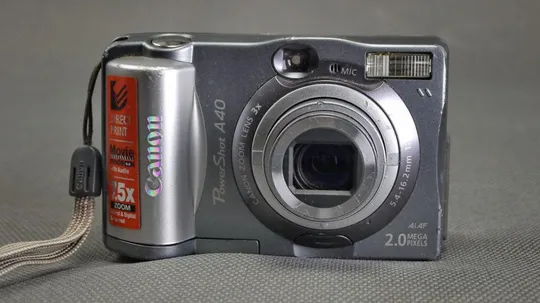 Купити Цифровий фотоаппарат 2.0Mpix Canon Power Shot A40 + x3.0 5.4-16.2mm Canon Aspheric lens Вживане