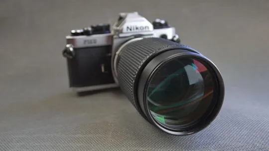 Об&#039;єктив Nikon Ai-s 70-210mm f/4.0 MC Series E Ф62mm формат кадра 24x36mm Вживане З аукціону