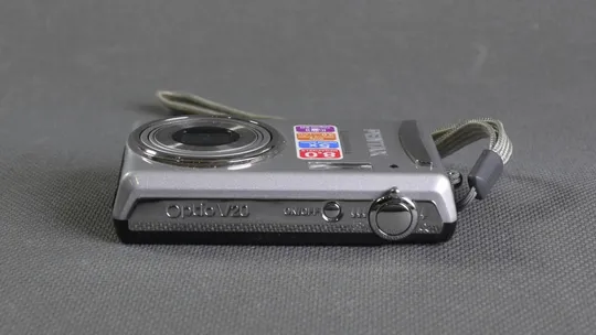 Цифровой фотоаппара 8.0Mpix Pentax Optio V20  +  x6.0 Pentax lens 6.3-31.5mm Вживане Де купити