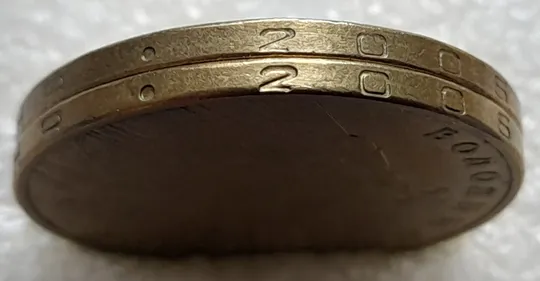 (1894да) 1 гривня 2006 різновиди викрошок у цифрі '2' слова "2006" на гурті (гурти різні) - 2 монети одним лотом (1 гривна 2006 брак) Ціна