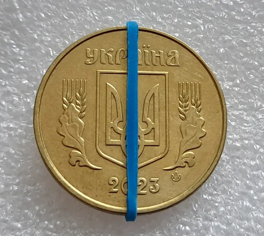 Купити (8036) 50 копійок 2023 поворот (порушення соосності) (50 копеек 2023 брак сдвиг)