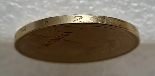 Купити (4822) 1 гривня 2006 різновид викрошки у цифрі "2" слова "2006" на гурті (1 гривна 2006 брак)