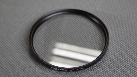 AmazonBasics UV 77мм. защитный ультрафиолетовый светофильтр 100% оригинал Japan Вживане Ціна