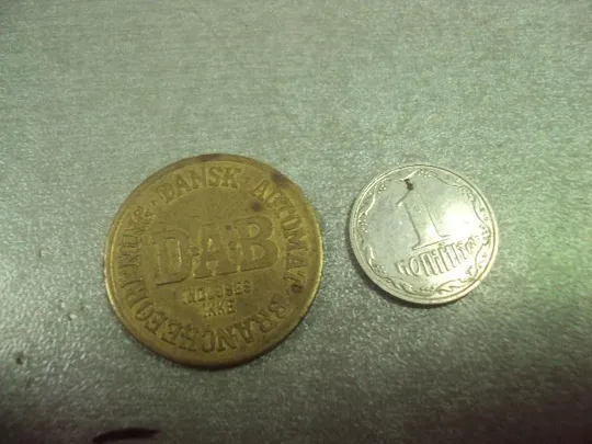 жетон монетовидный дания dansk automat brancheforening DAB №7961 Ціна