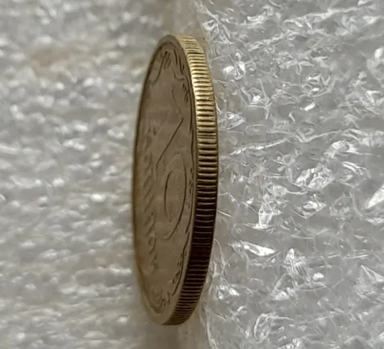 Купити (2035) 10 копійок 2002 брак гуртильного кільця на 12 год.(10 копеек 2002 брак гуртильного кольца)