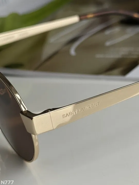 Сонцезахисні окуляри Saint Laurent SL 692 002 Brown/Gold M (EW0201) Продаж