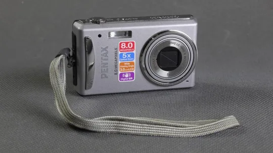 Цифровой фотоаппара 8.0Mpix Pentax Optio V20  +  x6.0 Pentax lens 6.3-31.5mm Вживане Ціна