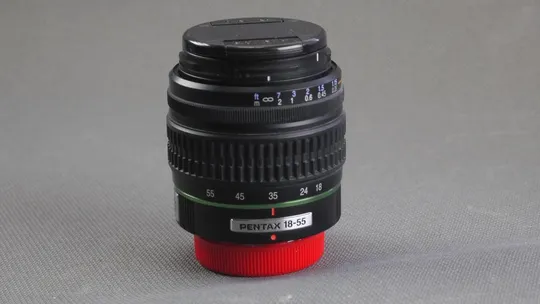Об&#039;єктив SMC Pentax-DA AF 18-55mm 1:3.5-5.6 AL Ф52мм штатный зум для цифровыx камер Pentax Вживане З аукціону