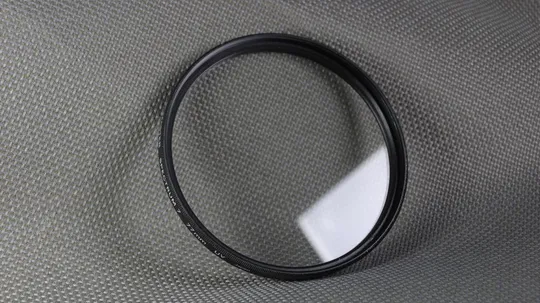 Promaster Spectrum 7 UV 77мм. защитный ультрафиолетовый светофильтр 100% Japan Вживане Ціна