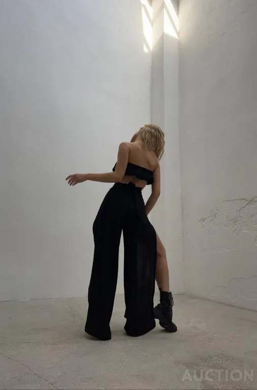 Жіночий костюм двійка спідниця-брюки та топ колір чорний Де купити