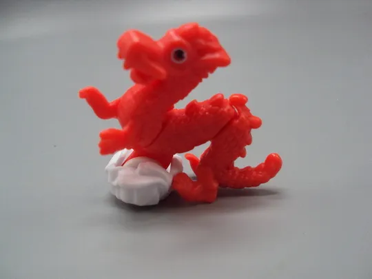 Фигурка киндер сюрприз VQ111B Ferrero дракон едет №18615л Недорого